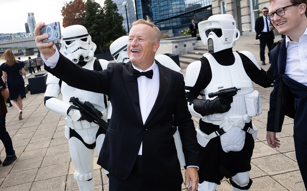 Guest posing with stormtroopers