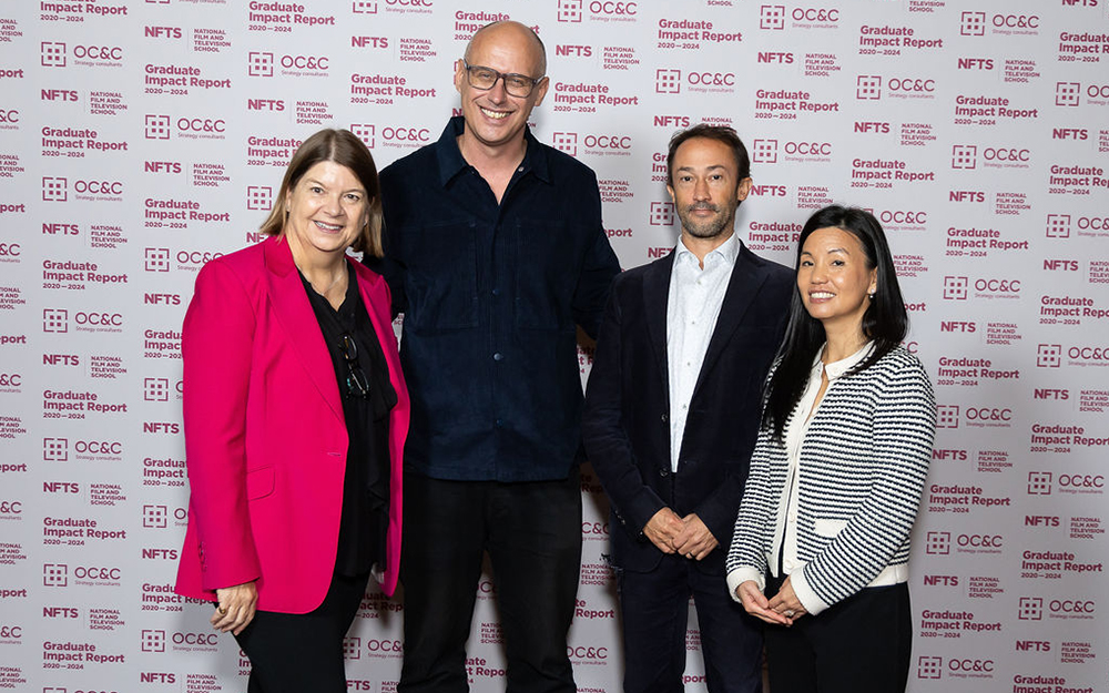 Sophie Turner Laing with Jon Wardle and others posing for camera