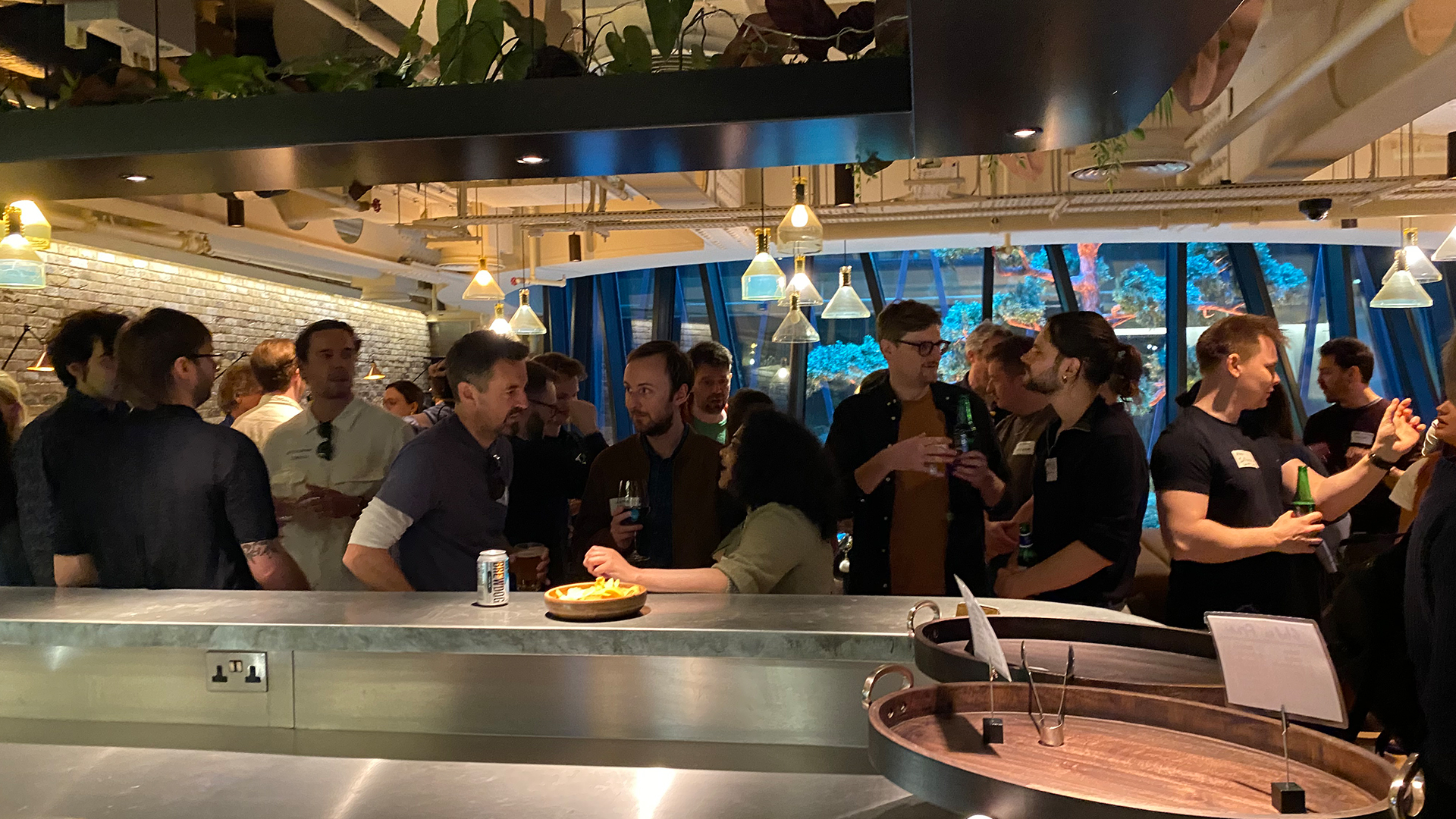 People socialising at bar